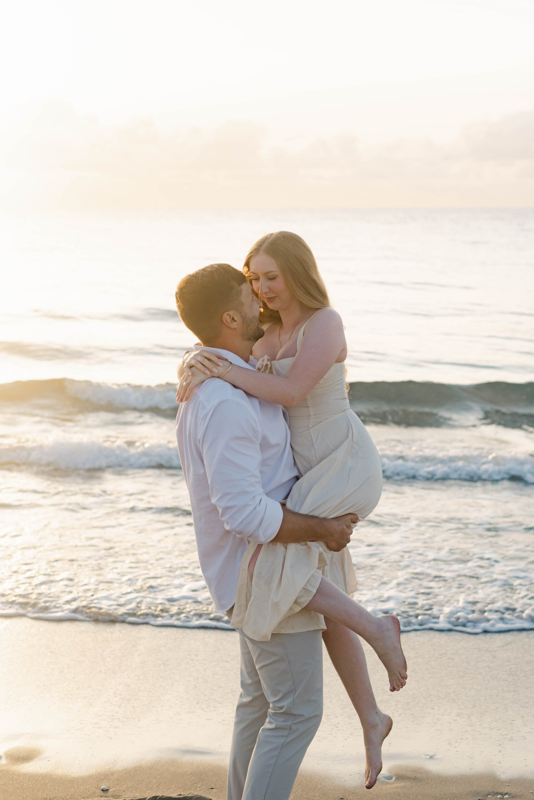 Romantic Palm Beach Island beach engagement session during golden hour
