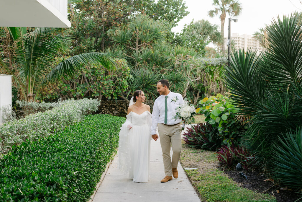Candid moment of couple walking together during portraits