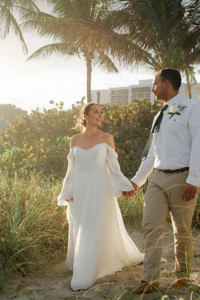 Sunlight behind the bride and groom during sunset portraits